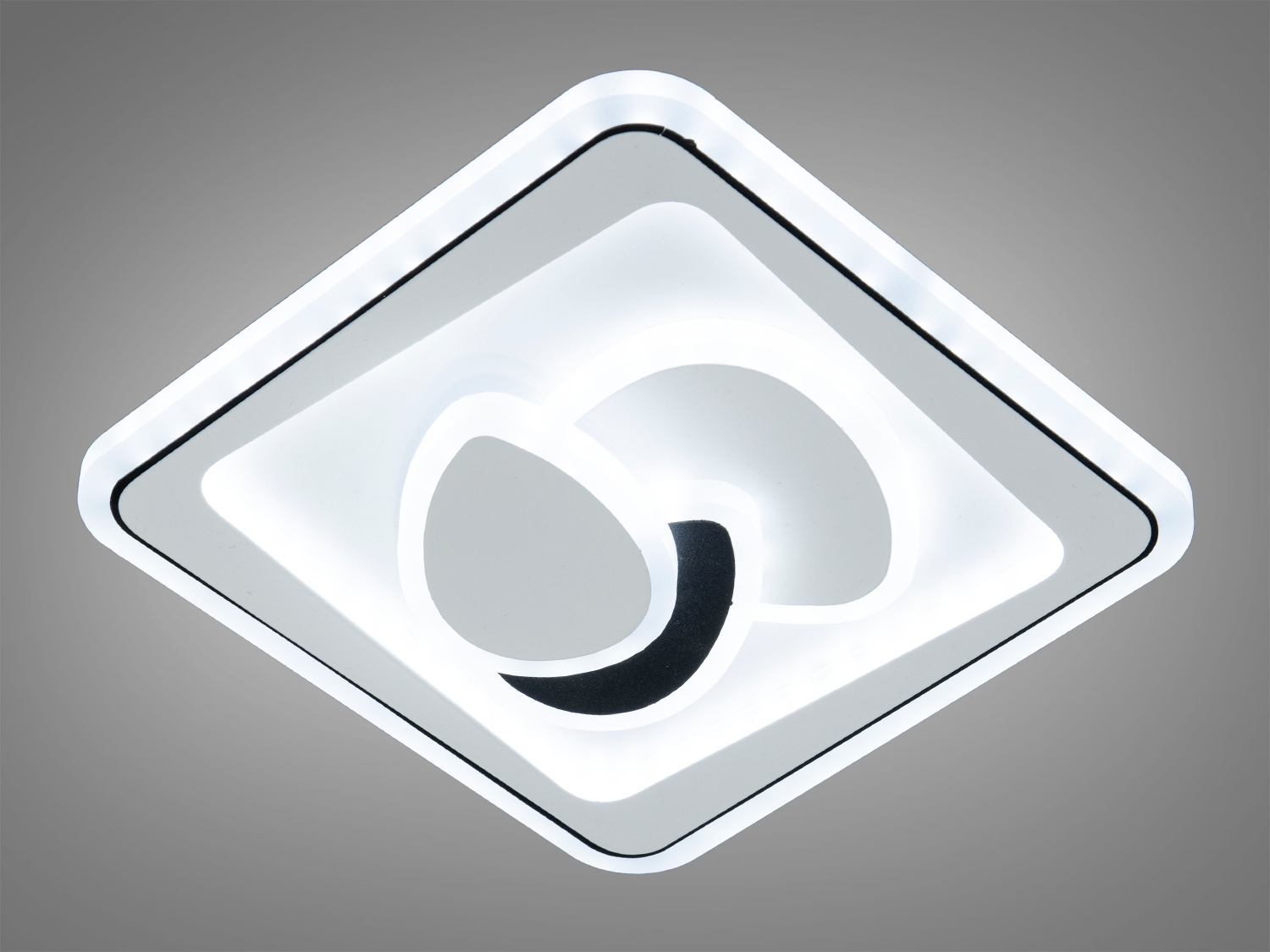 Стельовий світильник з квадратним корпусом, оснащений LED-підсвіткою, створює яскраве біле світло, ідеальний для офісних приміщень.