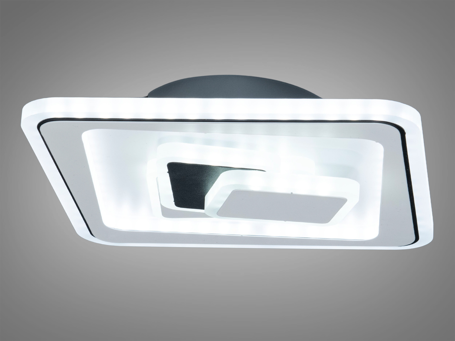 Світлодіодна стельова лампа квадратної форми з білим обрамленням, підходить для сучасного інтер’єру. Має вбудоване світлодіодне освітлення.