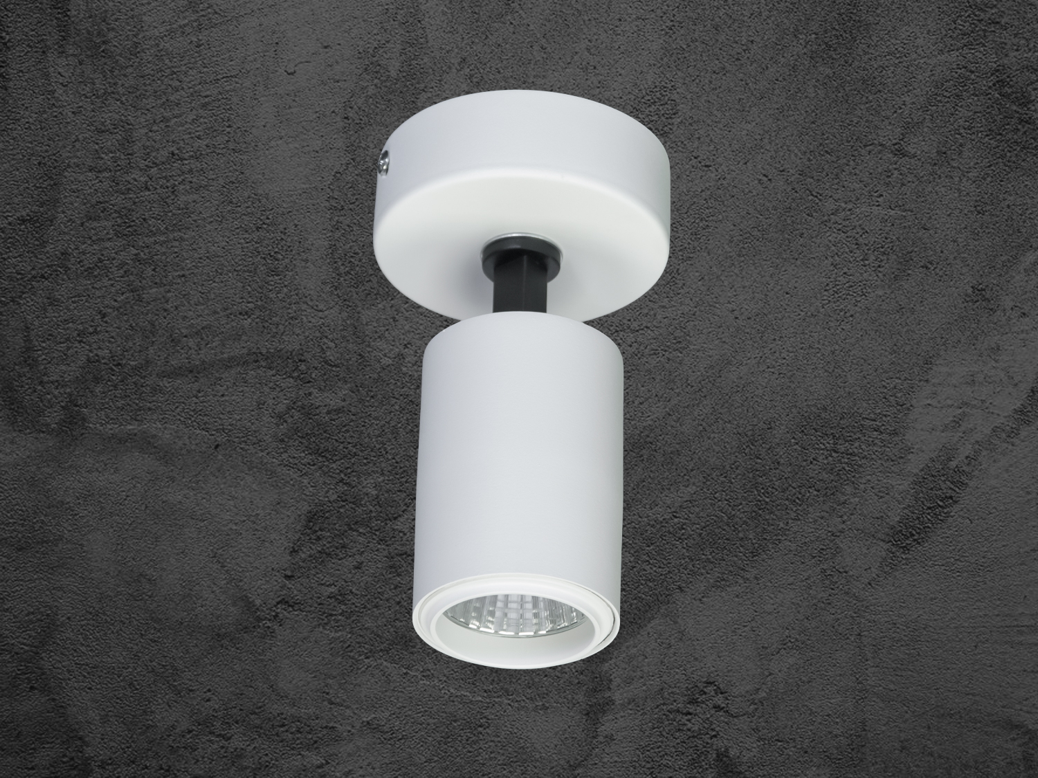 Білий світильник циліндричної форми з підвісним монтажем, підходить для освітлення вітальні.