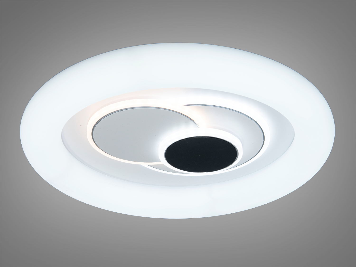 Світильник з холодним білим світлом, круглий дизайн. Підходить для офісних приміщень з сучасним стилем.