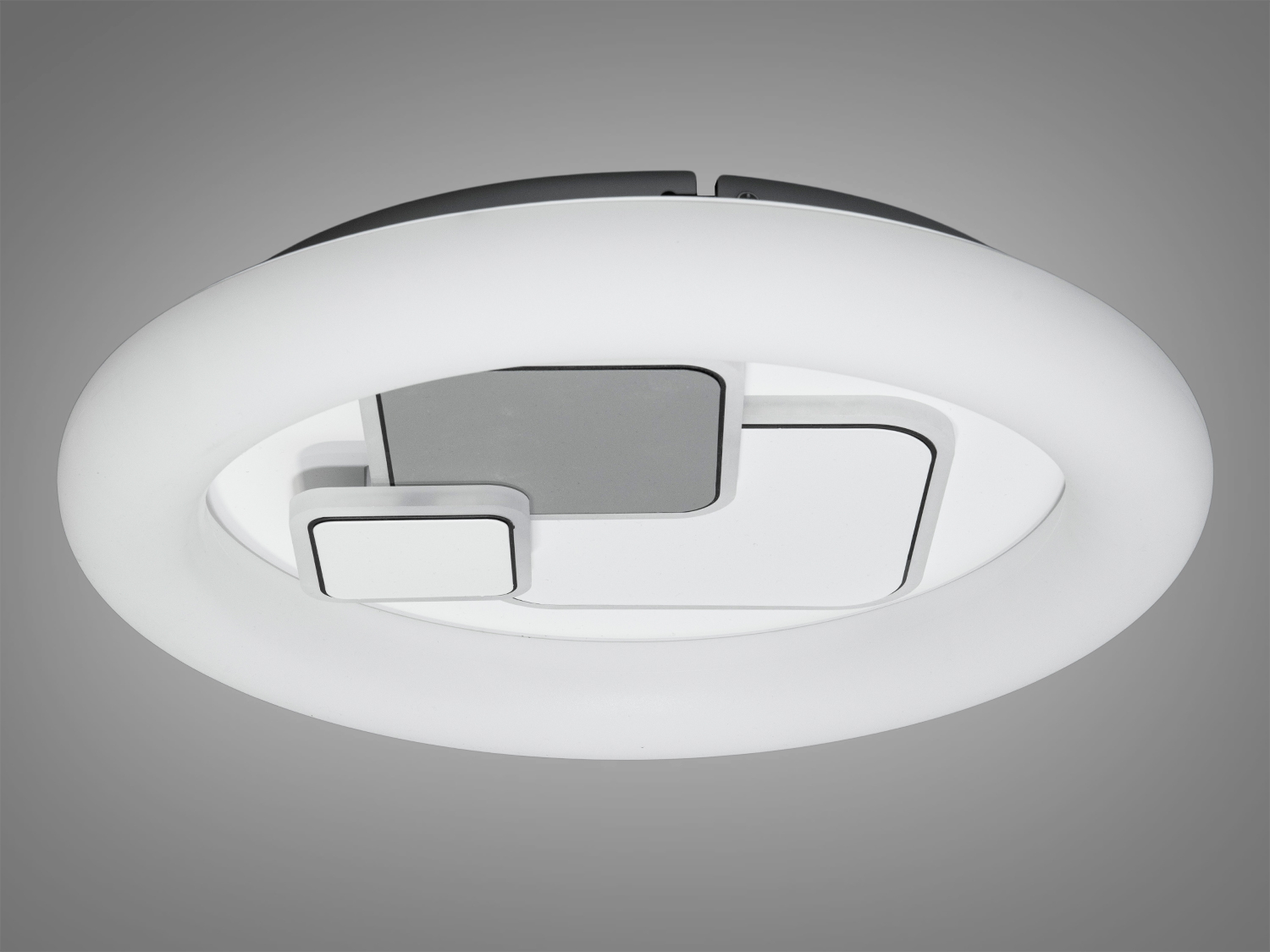 Стельова лампа з круглим світлодіодним кільцем і квадратними вставками. Підходить для офісів або житлових приміщень.