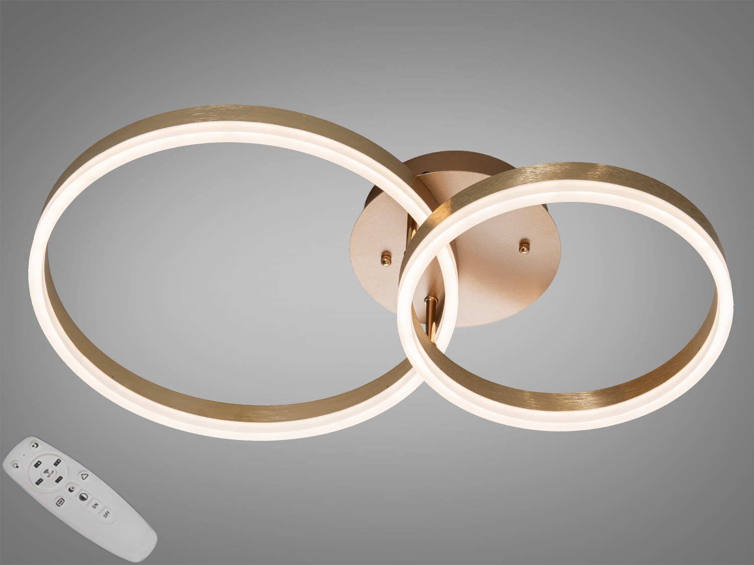 Стельовий світильник з двома кільцями та пультом дистанційного керування, підходить для регулювання яскравості в кімнаті.