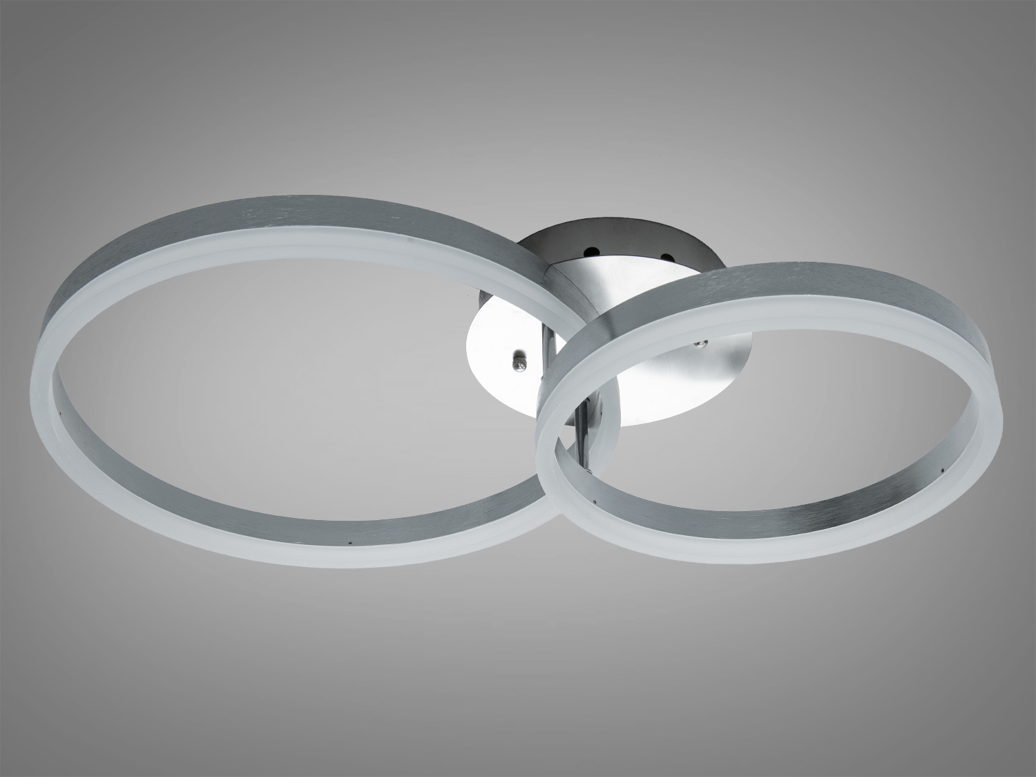 Стельовий світильник з двома круглими кільцями, виготовлений з металу, підходить для сучасного інтер’єру.