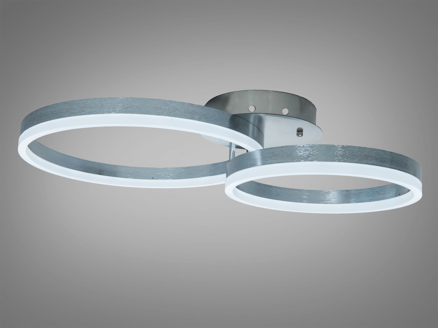 Стельовий світильник з двома металевими кільцями, забезпечує яскраве освітлення для просторих кімнат.