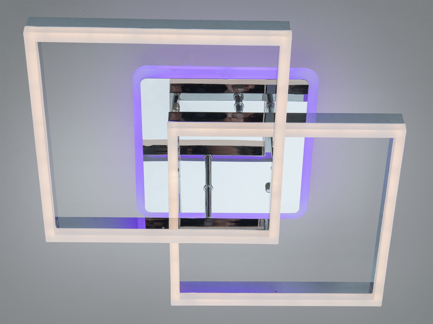 Світильник з квадратними рамами, що перекриваються, з білим світлодіодним підсвічуванням. Призначений для стельового монтажу.