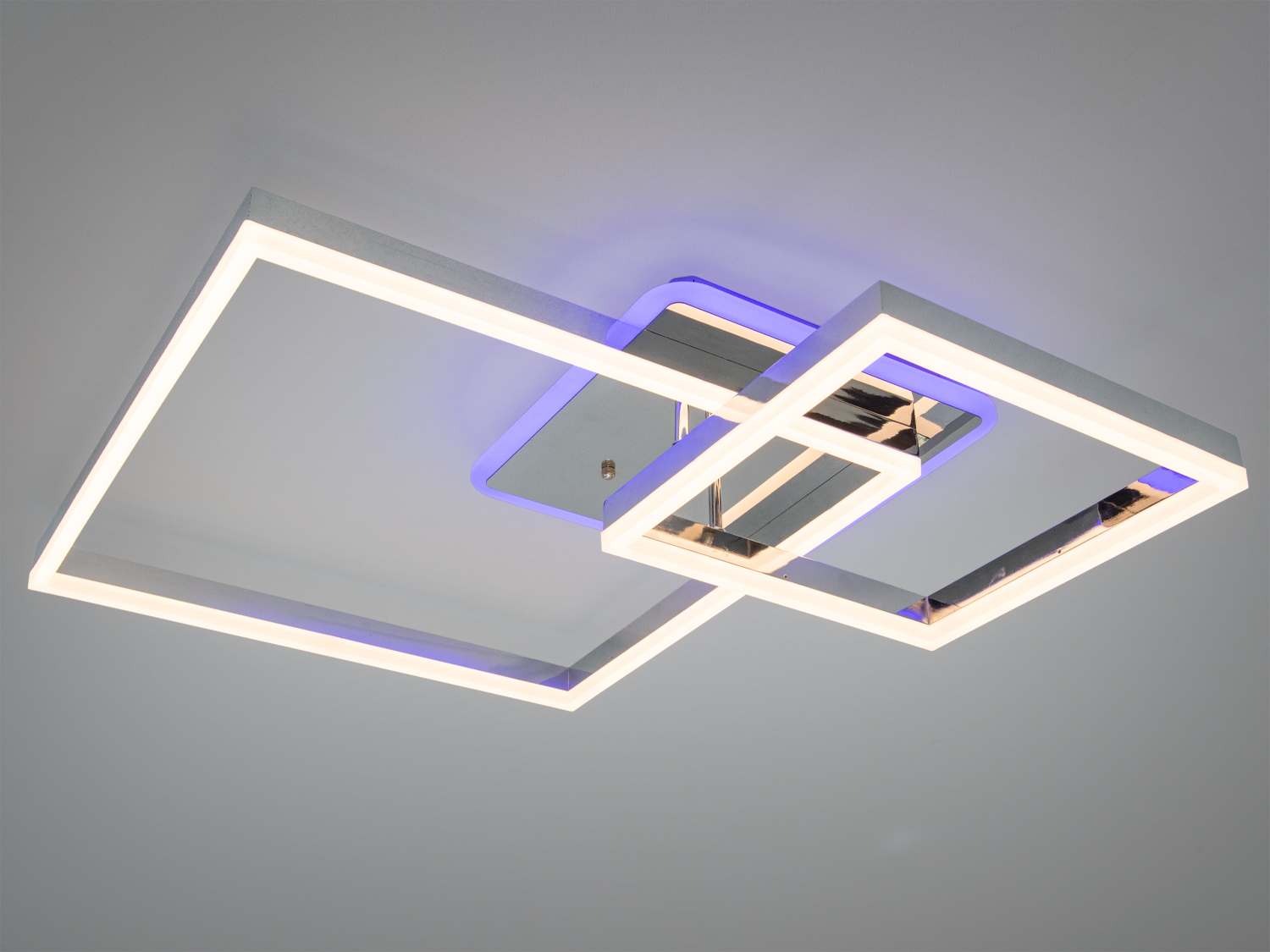 Стельовий світильник із двома квадратними рамками, що перетинаються, з теплим світлом, підходить для вітальні.