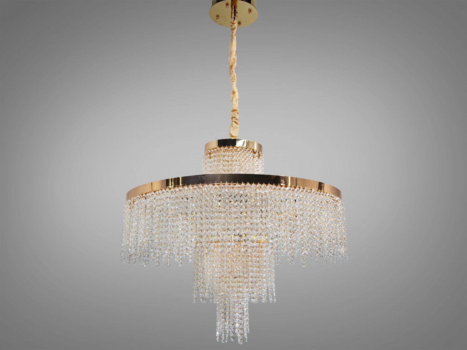 Кришталева люстра золото кругла з каскадними підвісками