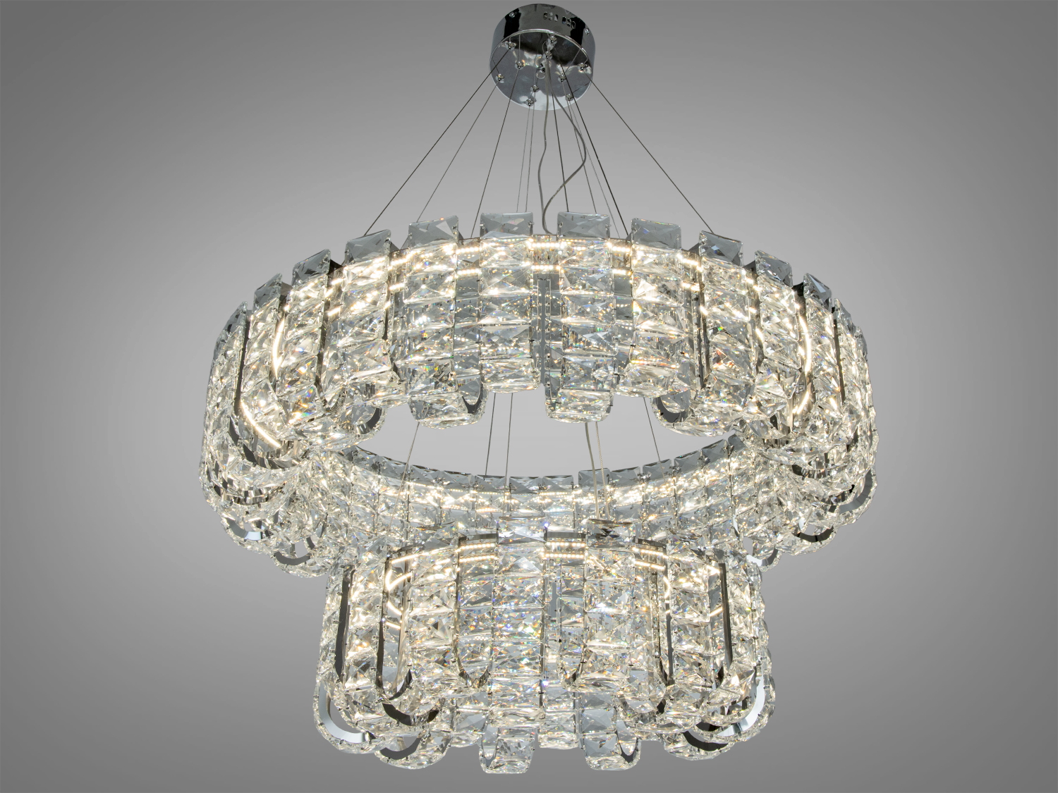 Світлодіодна підвісна люстра хром з кришталевими елементами та пультом дистанційного керування для сучасних просторих приміщень.