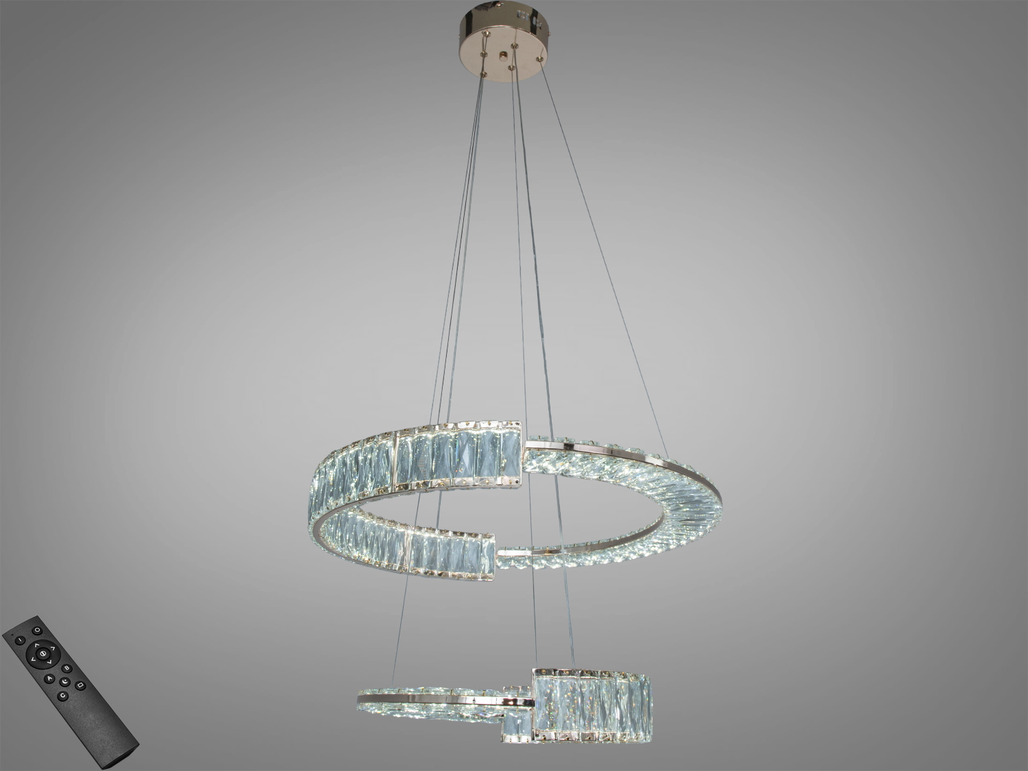 Підвісна люстра з дистанційним керуванням, два кільця з кришталевими елементами, ідеальна для регульованого освітлення.