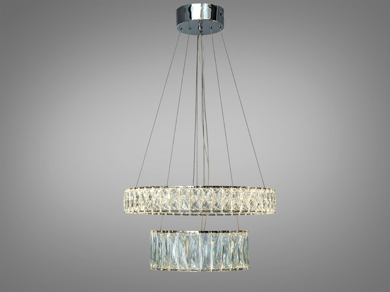 Двоярусна люстра з кришталевими кільцями, підвішена на тросах. Відмінно підходить для просторих приміщень.