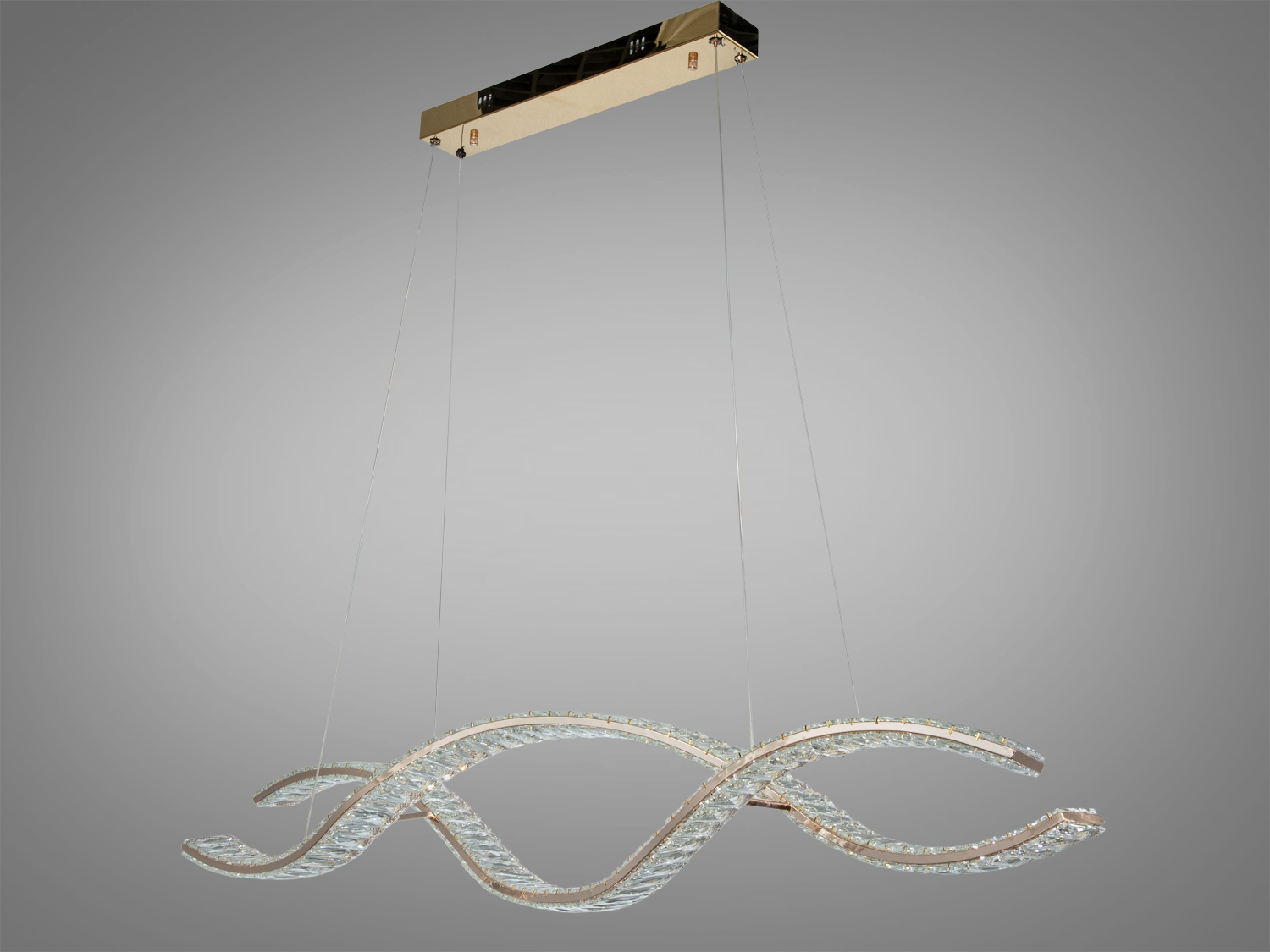 Підвісний світильник хвилеподібної форми з металевою основою, підходить для сучасного інтер’єру.