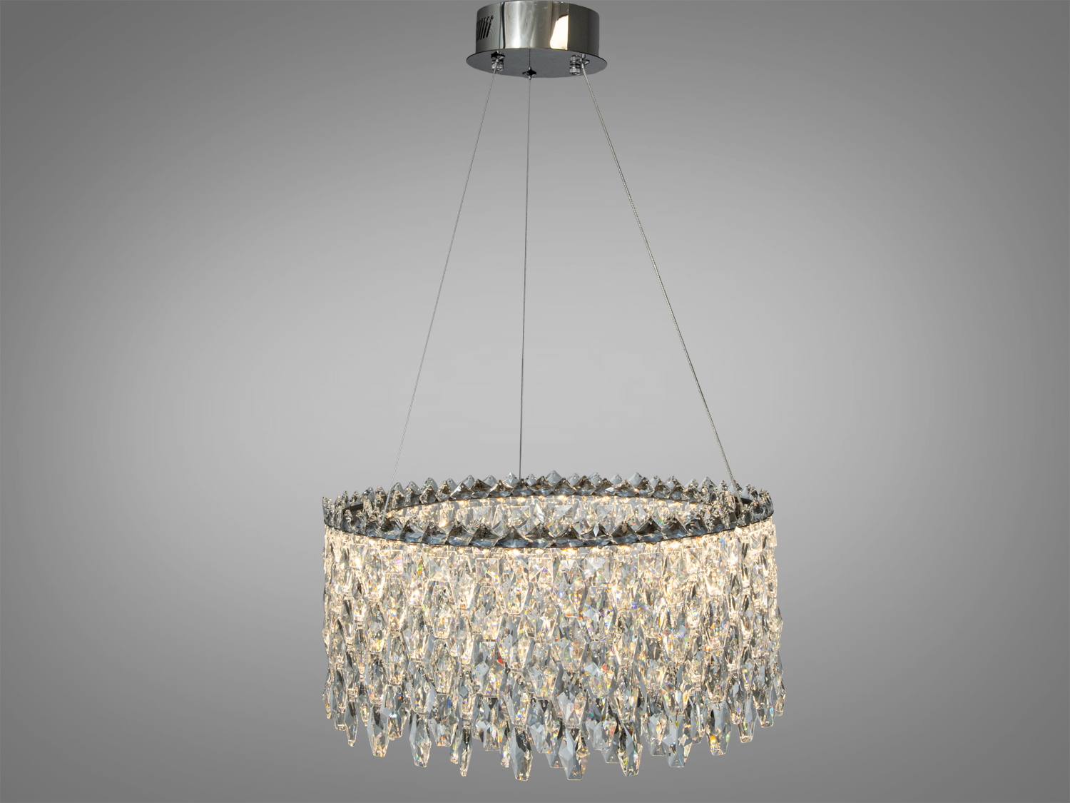 Підвісна люстра з кришталевими підвісками, кругла форма, підходить для класичного інтер’єру, кріплення на тросах.