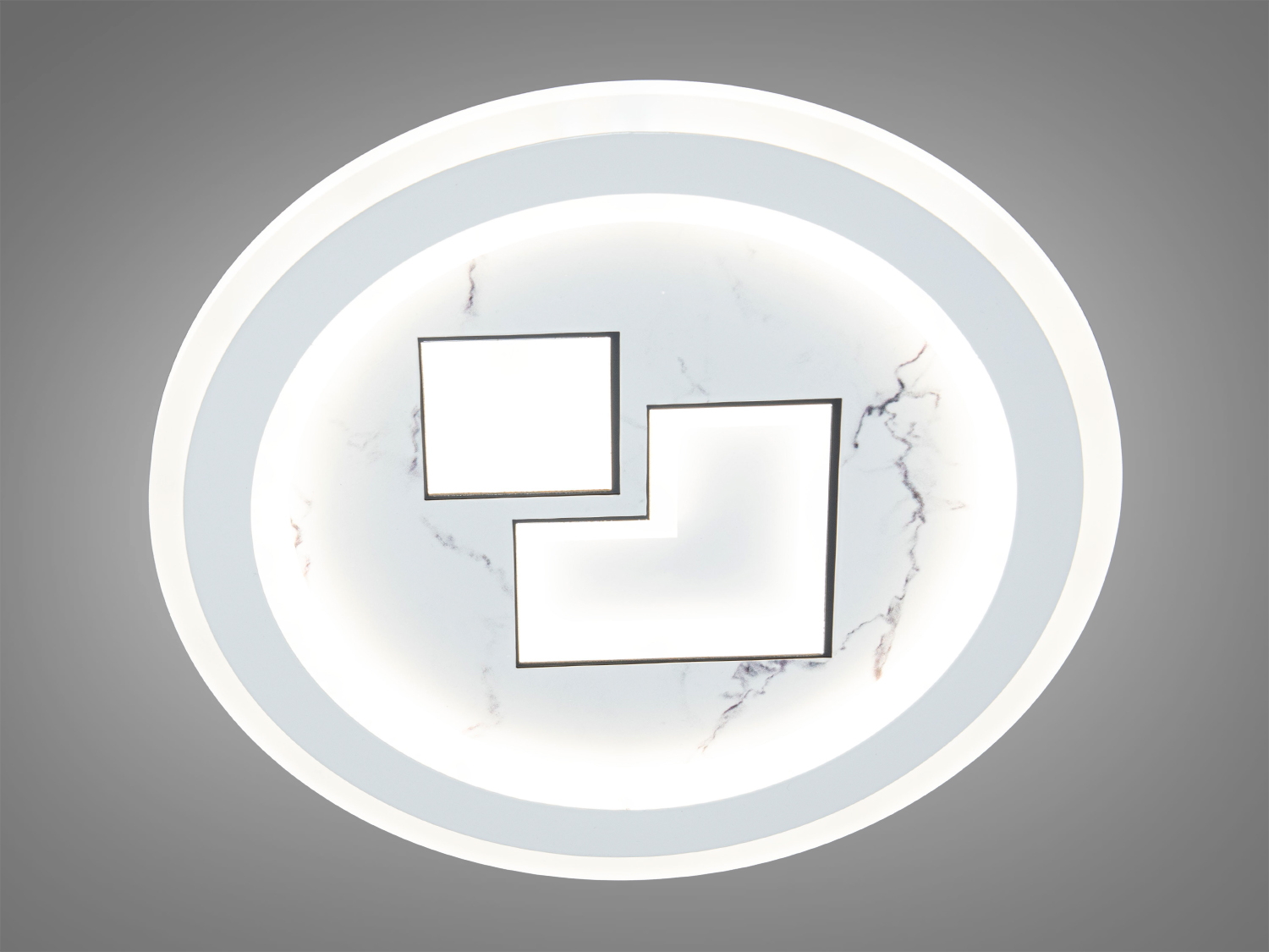 Кругла лампа з геометричними формами та мармуровим акцентом. Ідеальна для стильного освітлення вітальні.