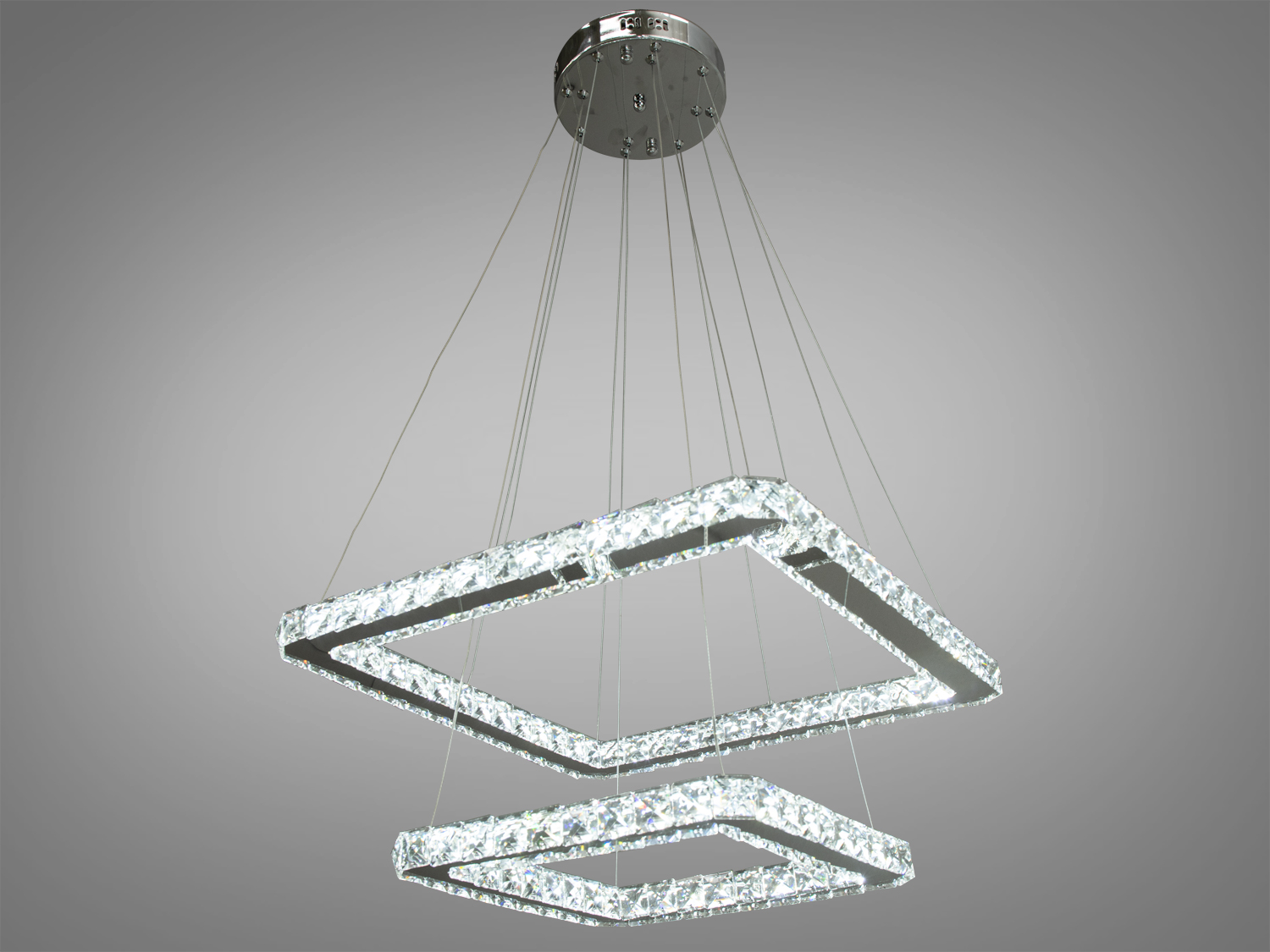 Підвісний світильник з двома квадратними плафонами, які випромінюють яскраве біле світло, підходить для офісних приміщень.