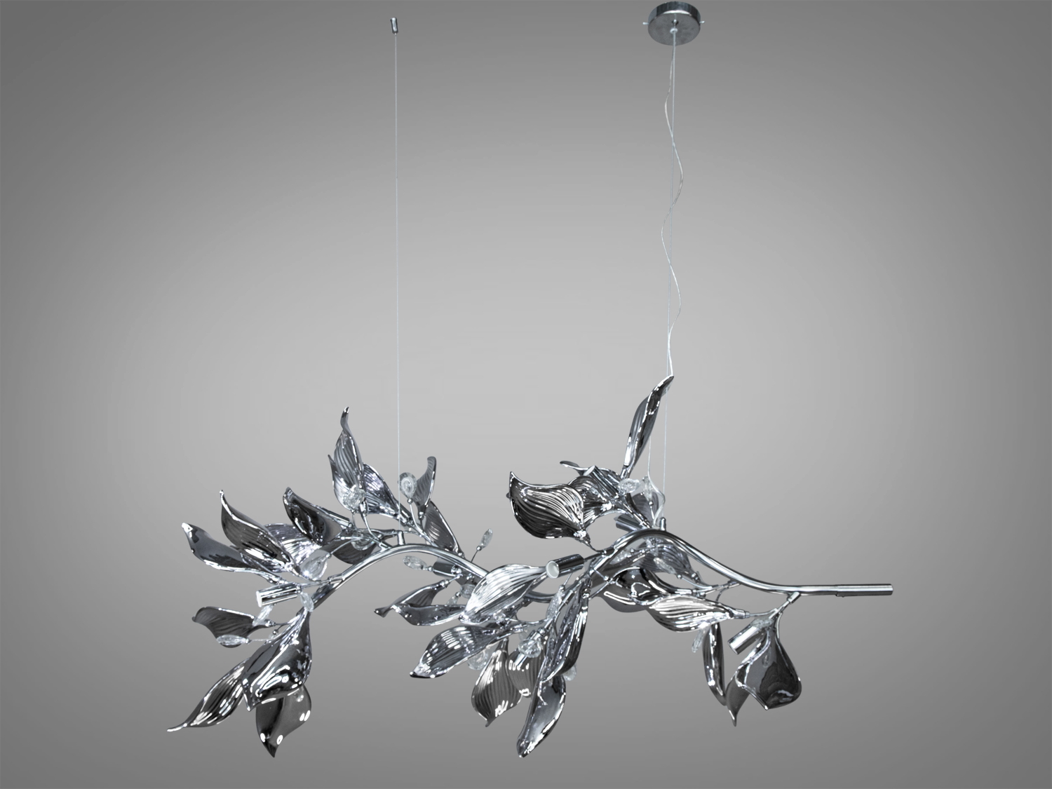 Люстра на підвісних тросах регулюється за висотою.