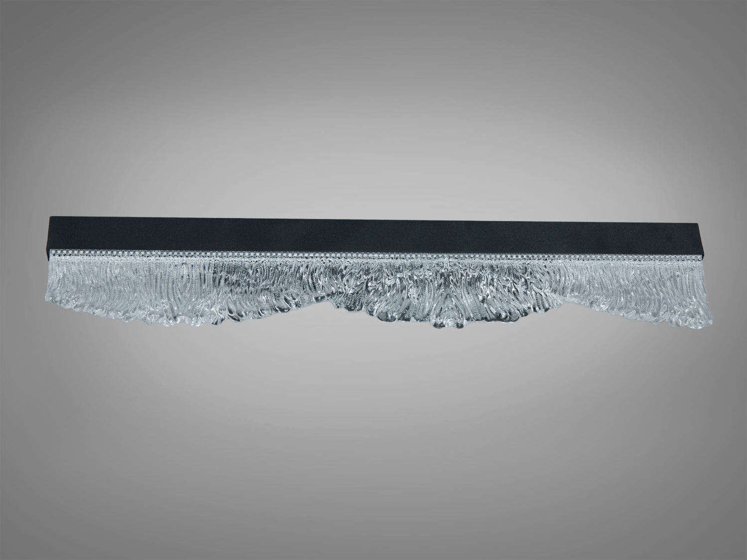 Лінійний світильник з хвилястим скляним дизайном. Ідеальний для настінного монтажу в сучасних приміщеннях.