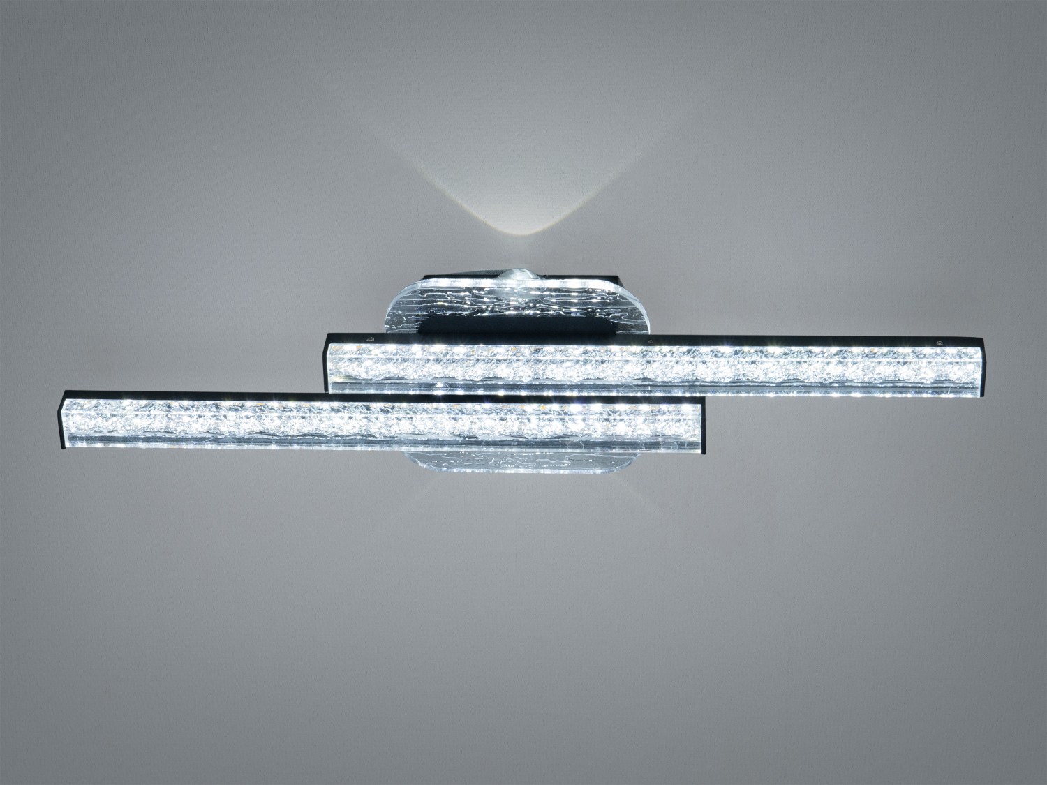 Горизонтальний світильник з двома довгими трубками, що розташовані паралельно. Випромінює яскраве світло, підходить для освітлення великих приміщень.