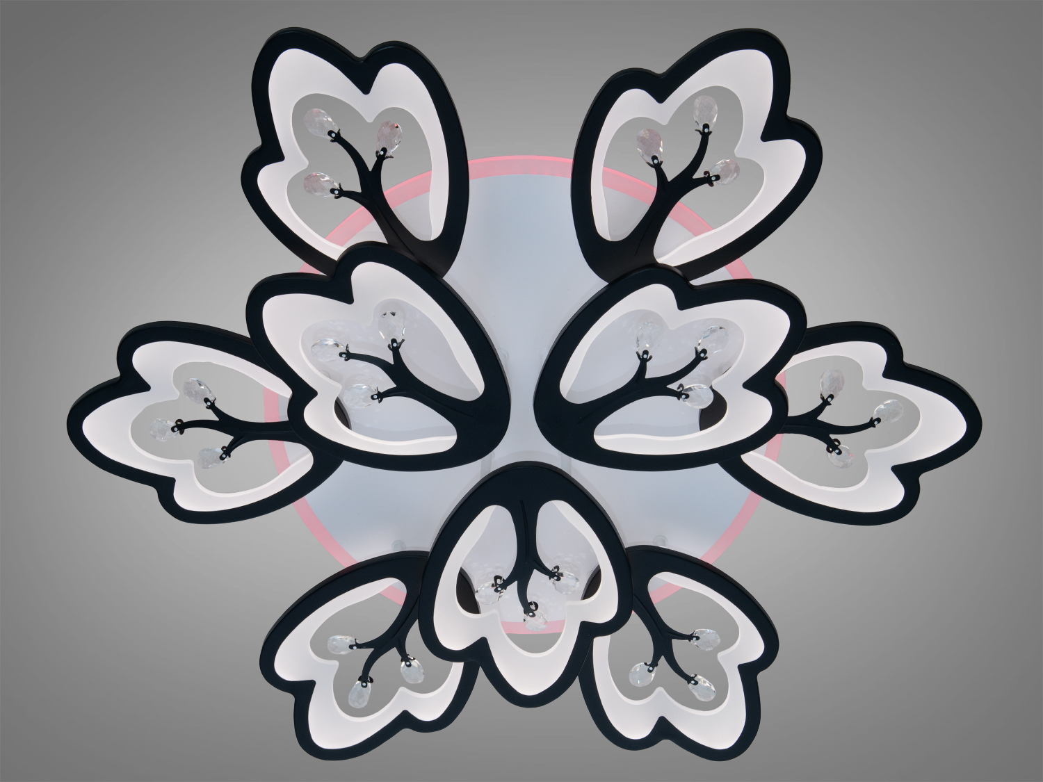 Стельовий світильник у формі квітки з чорними контурами та білим підсвічуванням, підходить для сучасних інтер’єрів.