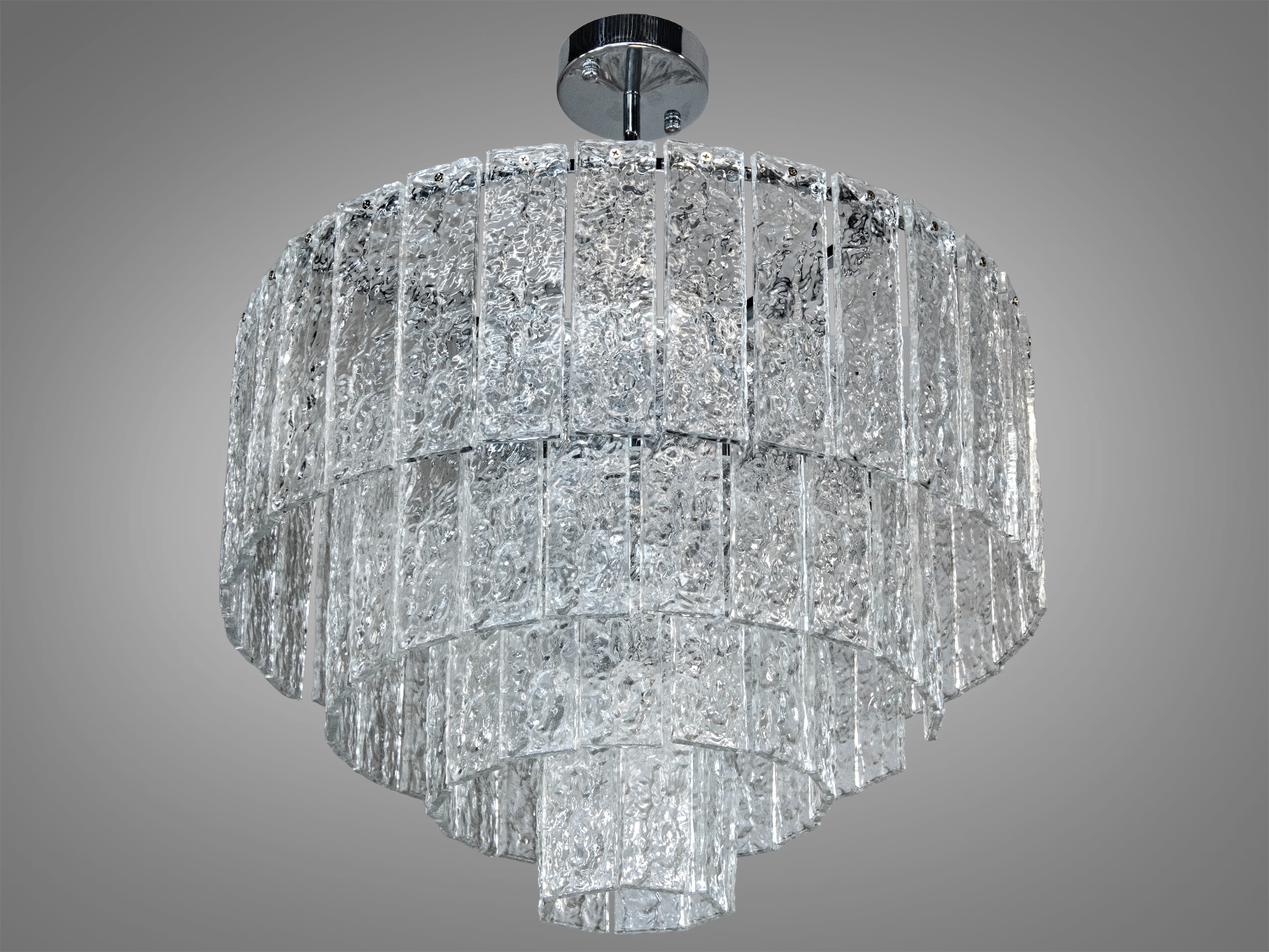 Каскадна люстра з прозорого скла з текстурованими елементами. Підходить для сучасного інтер′єру, забезпечуючи м′яке освітлення.