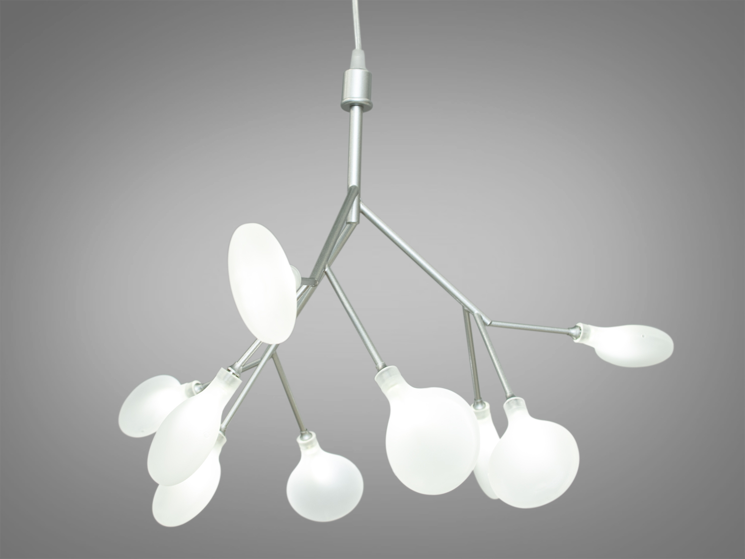 Світильник з декількома гнучкими гілками, кожна з яких закінчується матовим плафоном. Ідеальний для зонального освітлення.