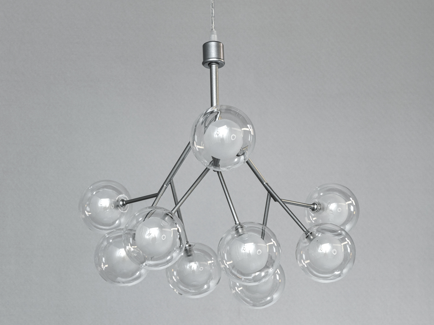 Люстра з вісьмома скляними кулями на металевих прутах, підходить для великих просторів. Прозорі елементи підкреслюють легкість конструкції.