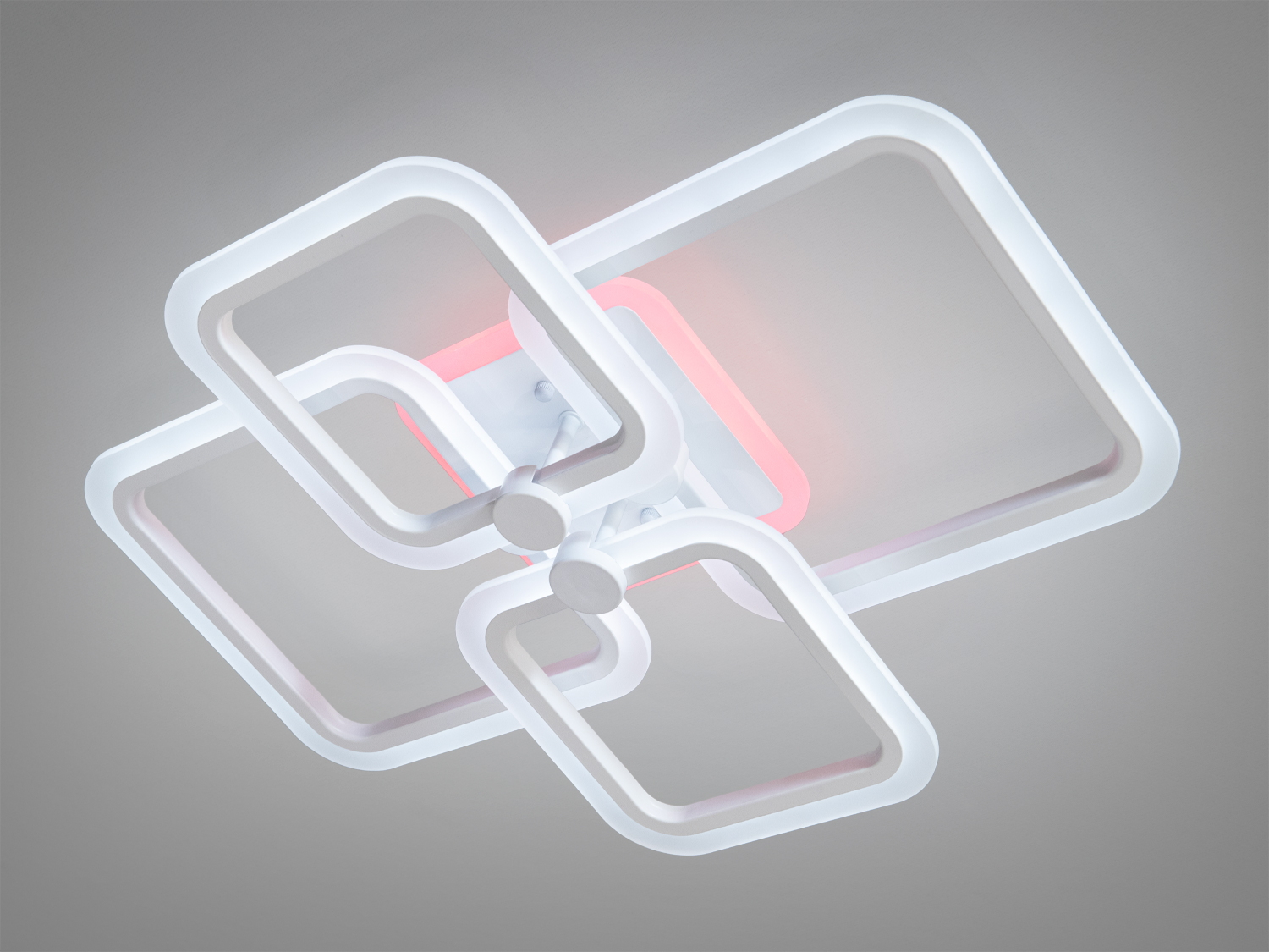 Світильник зі світлодіодними квадратами, що створюють м’яке рожеве світло. Ідеально підходить для сучасних інтер’єрів.