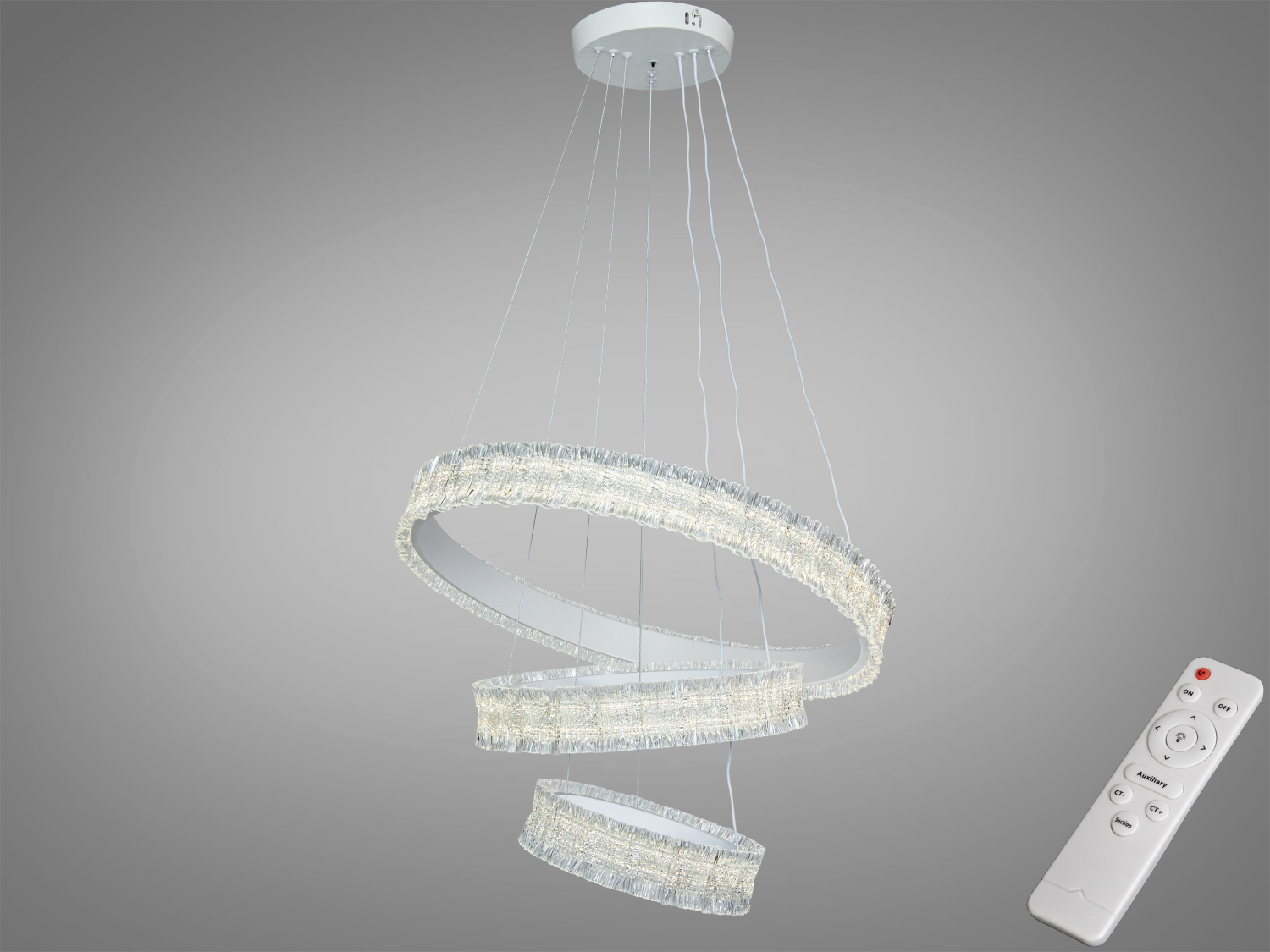 Підвісний світильник з пультом дистанційного керування. Має три кільця, що випромінюють м’яке світло, підходить для сучасного інтер’єру.