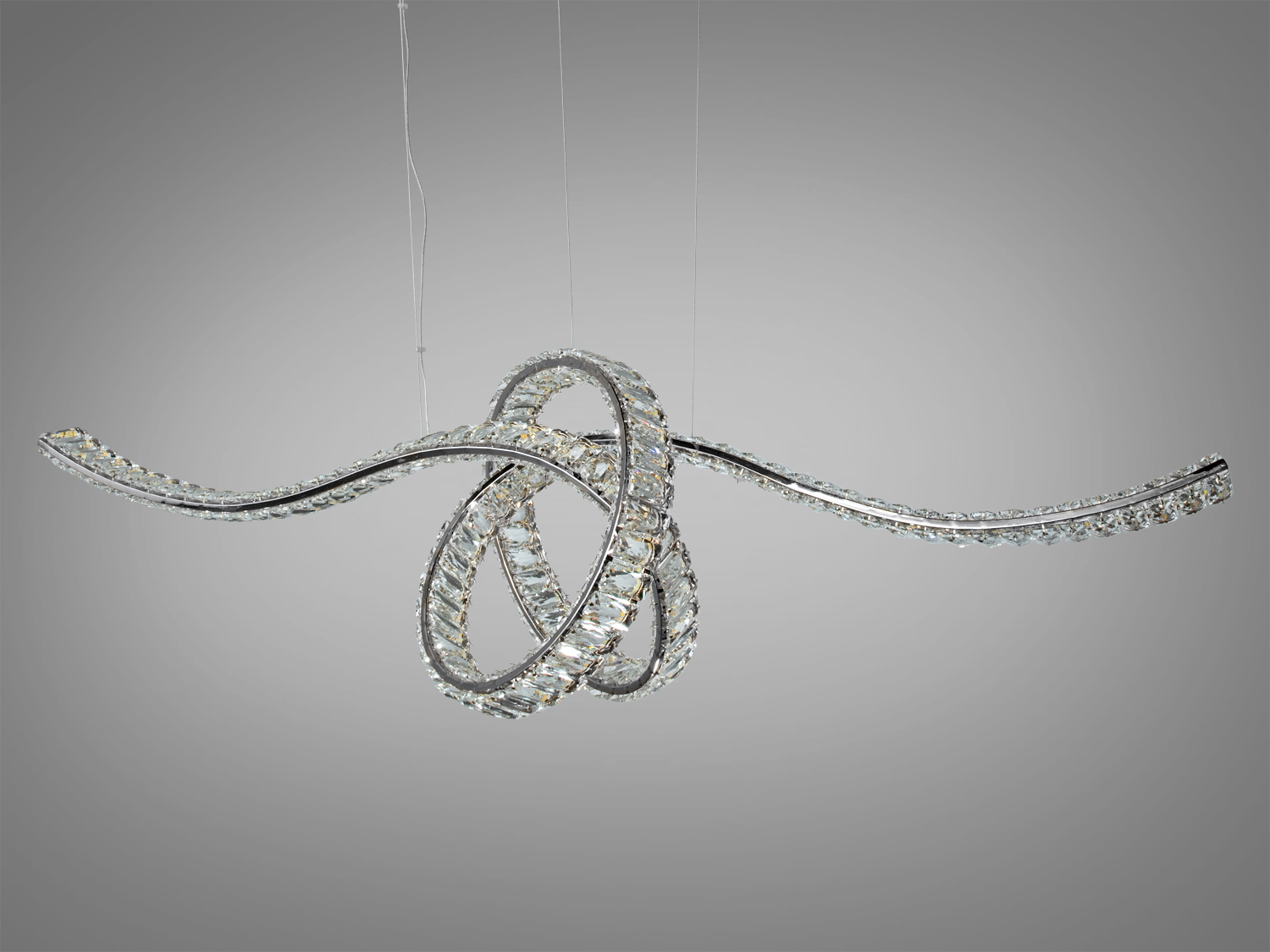 Світильник підвісний з кришталевими елементами, що утворюють складний вузол. Ідеальний для стильного освітлення.