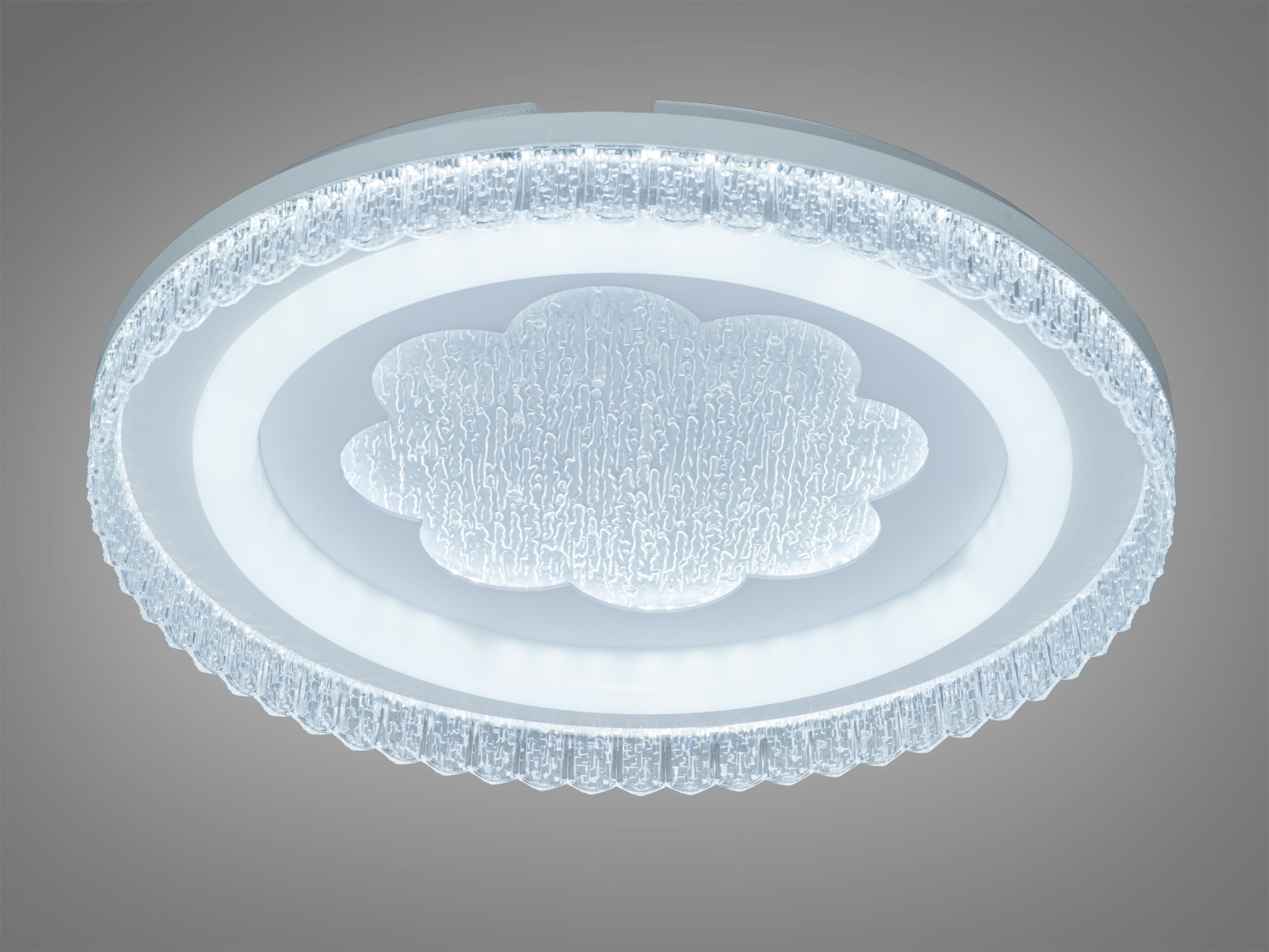 Стельова лампа з текстурованим візерунком, що нагадує хмару, має вбудоване світлодіодне освітлення. Ідеальна для офісних приміщень.