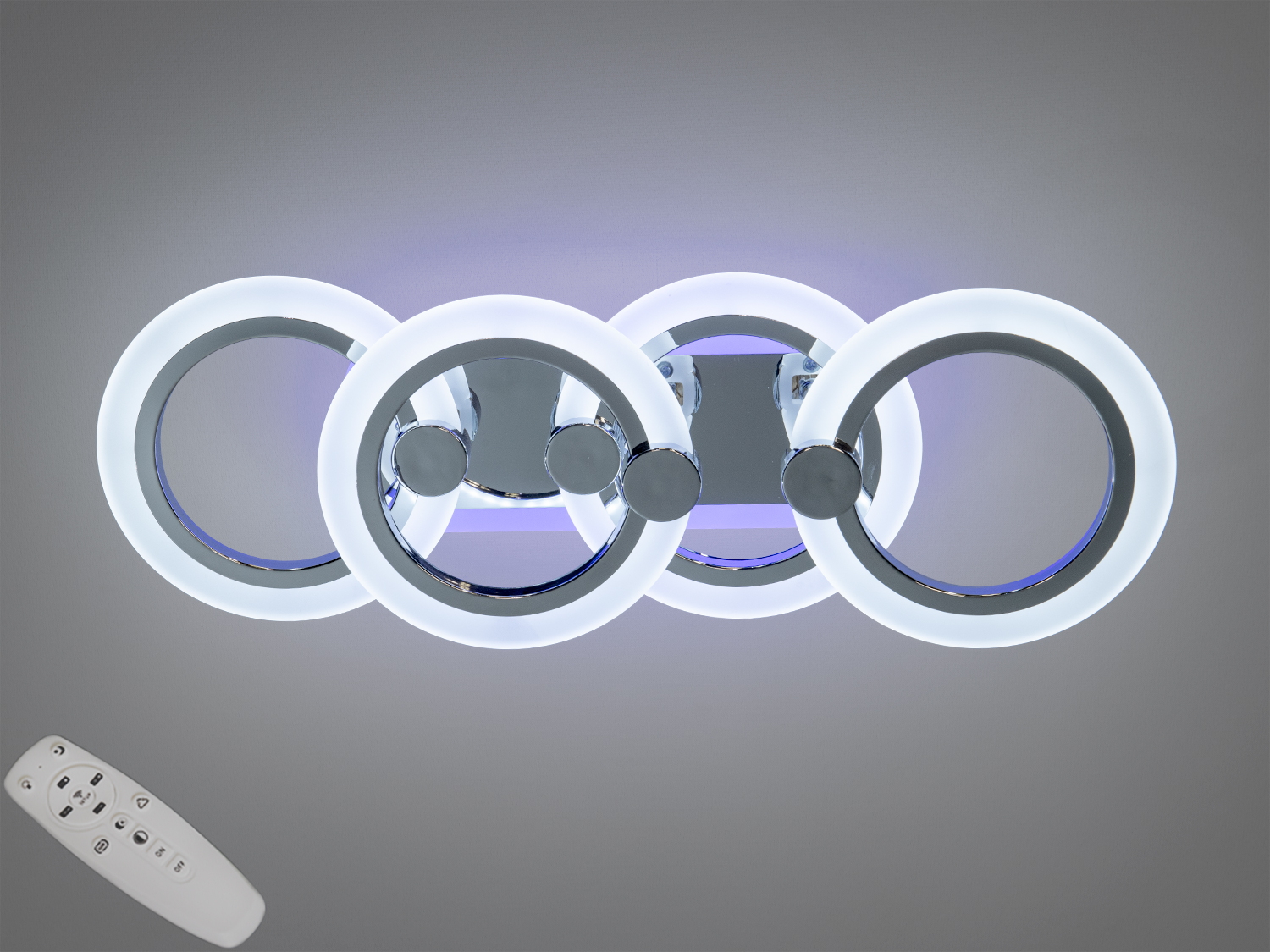 Світильник з чотирма LED кільцями, що випромінюють холодне світло, з пультом дистанційного керування. Ідеально для сучасного інтер′єру.