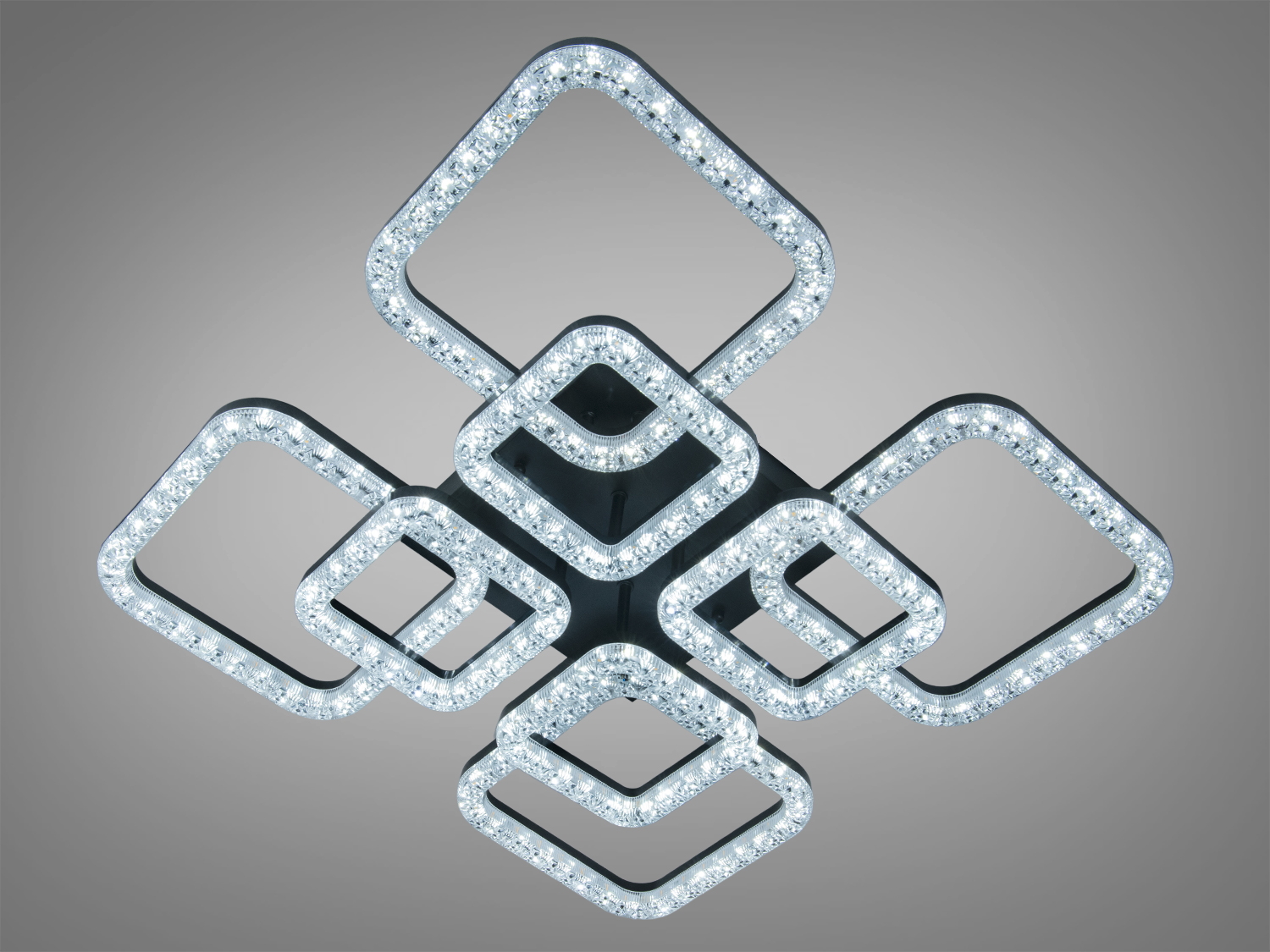 Світильник із квадратних рамок, що перекриваються, з холодним білим світлом, ідеальний для мінімалістичного дизайну.