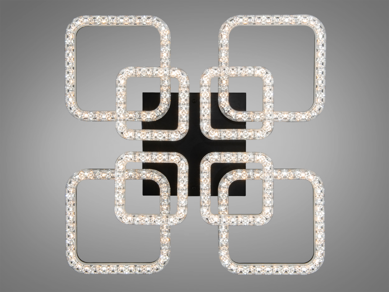 Світильник із симетрично розташованими квадратами, з вбудованими світлодіодами, підходить для стельового монтажу.