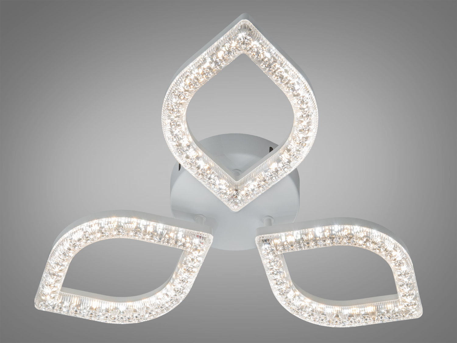 Стельовий світильник з трьома LED елементами у формі листя, що створюють м′яке освітлення. Ідеальний для сучасного інтер’єру.