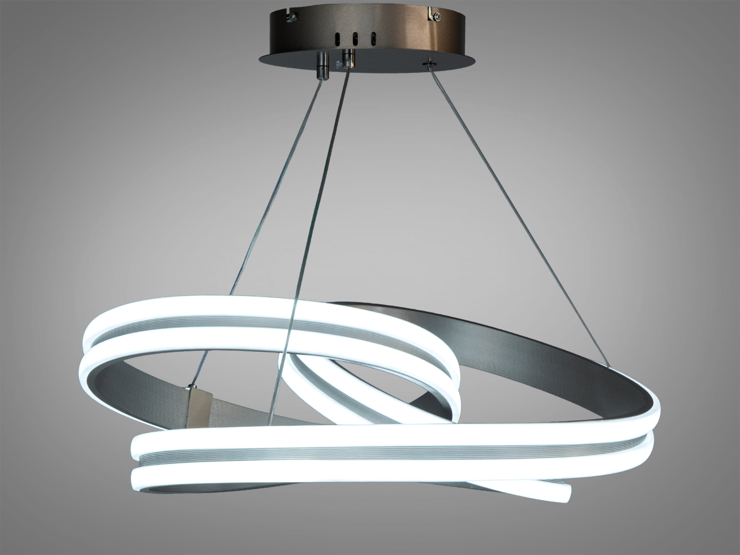 Підвісний світильник з LED підсвіткою, виконаний у вигляді переплетених кілець. Ідеально підходить для сучасного інтер′єру.