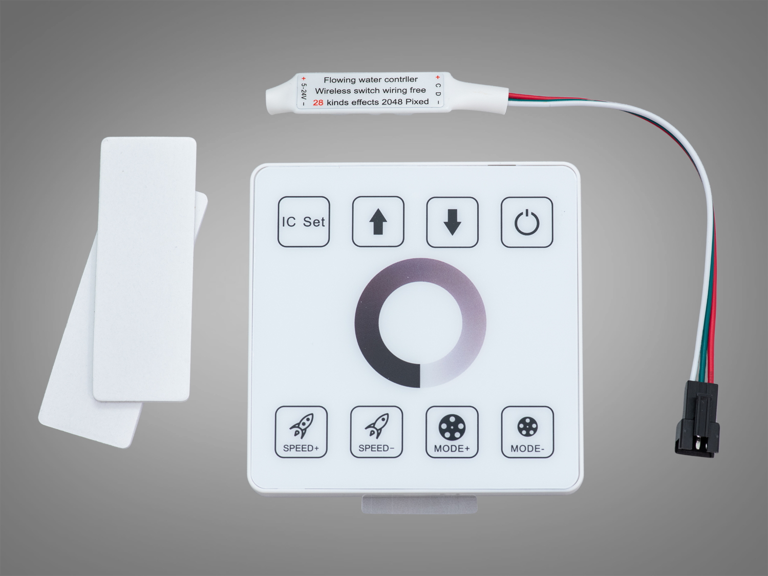 Контролер SPI для одноколірної адресної LED-стрічки з 28 ефектами, кнопками та бездротовим перемикачем. Живлення 5–24 В, компактний корпус для інтер’єру.