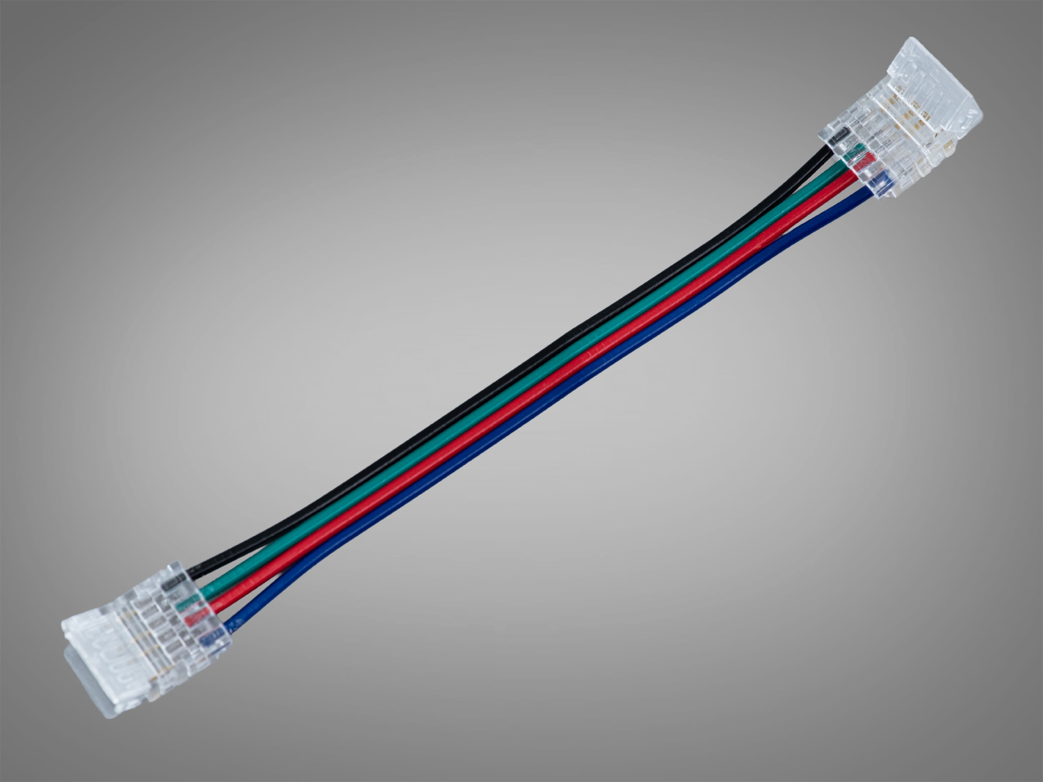 Прозорий кабель‑конектор 4pin 10 мм для RGB LED стрічки. Складне місце стику стає майже непомітним, монтаж без пайки, внутрішнє застосування.