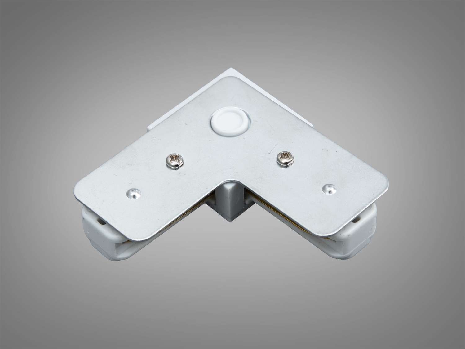 Металевий кутовий з′єднувач для трекових систем освітлення, з білим пластиковим корпусом, підходить для різних інтер′єрних рішень.