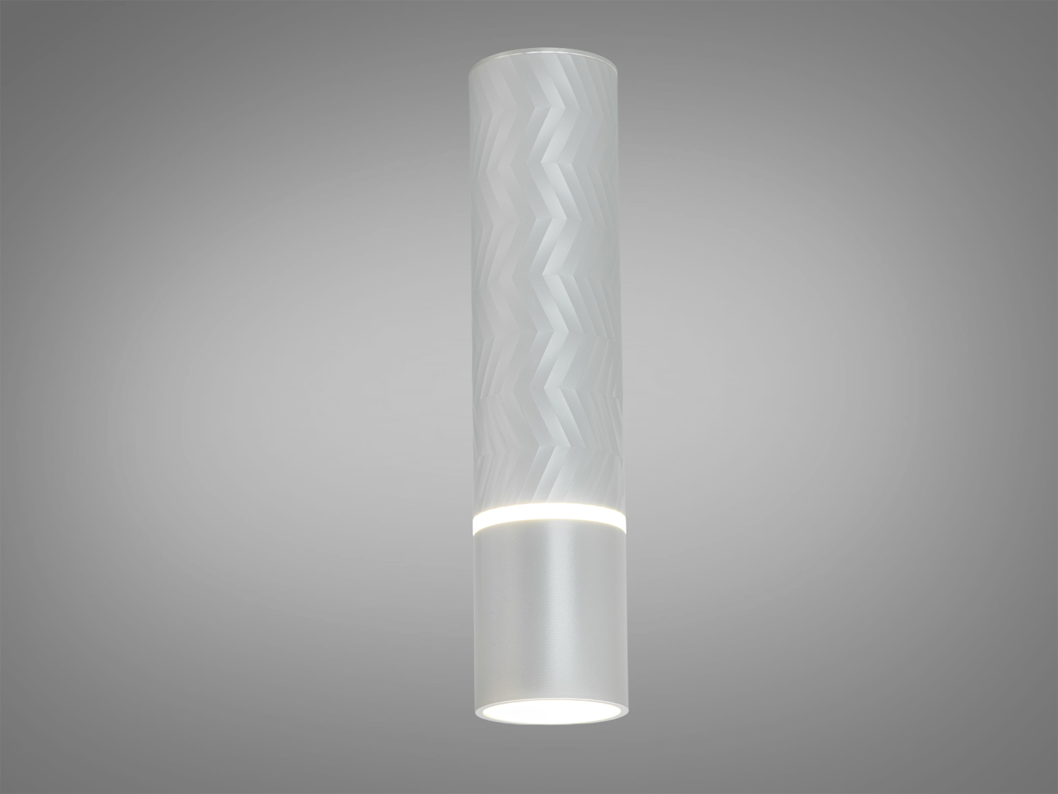 Циліндрична підвісна лампа з візерунком у формі зигзагів, виконана з матового скла. Підходить для сучасних інтер′єрів.
