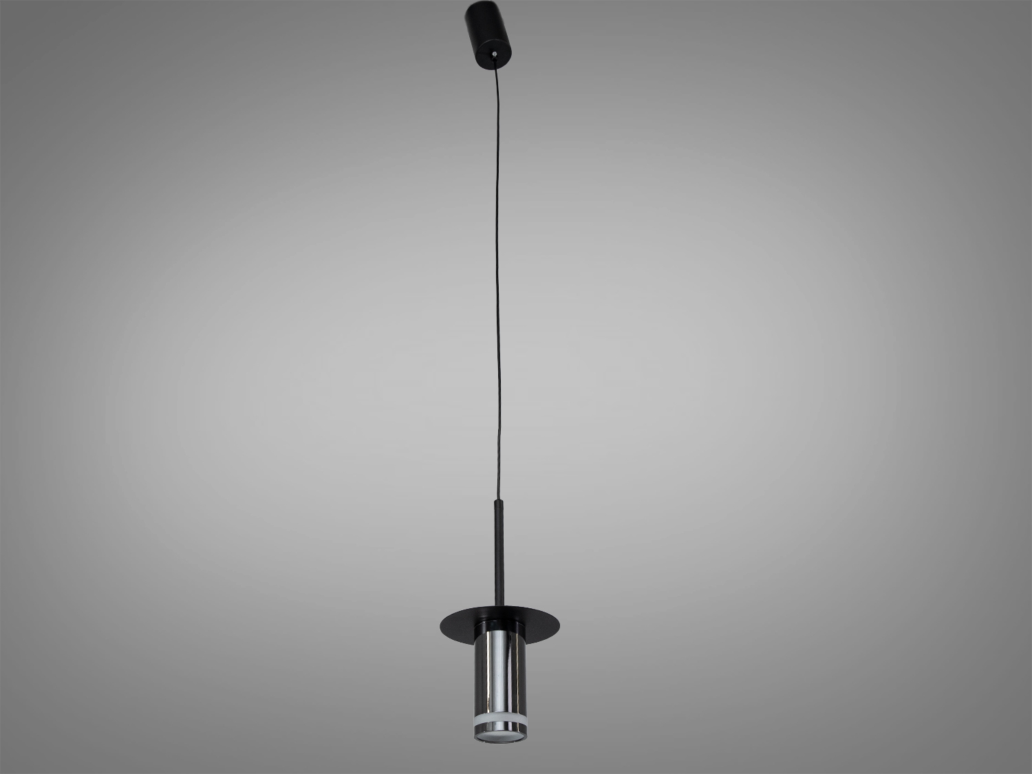 Підвісний світильник з матовим чорним покриттям, циліндрична форма, підходить для офісних приміщень. Легкий монтаж на стелю.