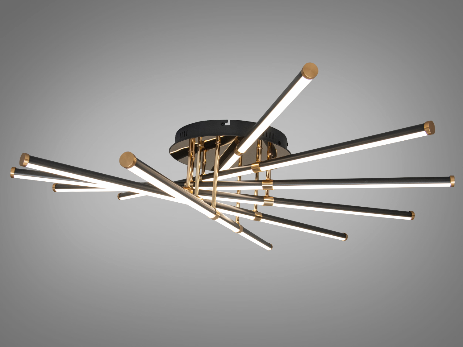 Стельовий світильник з горизонтальними світлодіодними трубками, що кріпляться до чорної основи, підходить для мінімалістичних інтер’єрів.