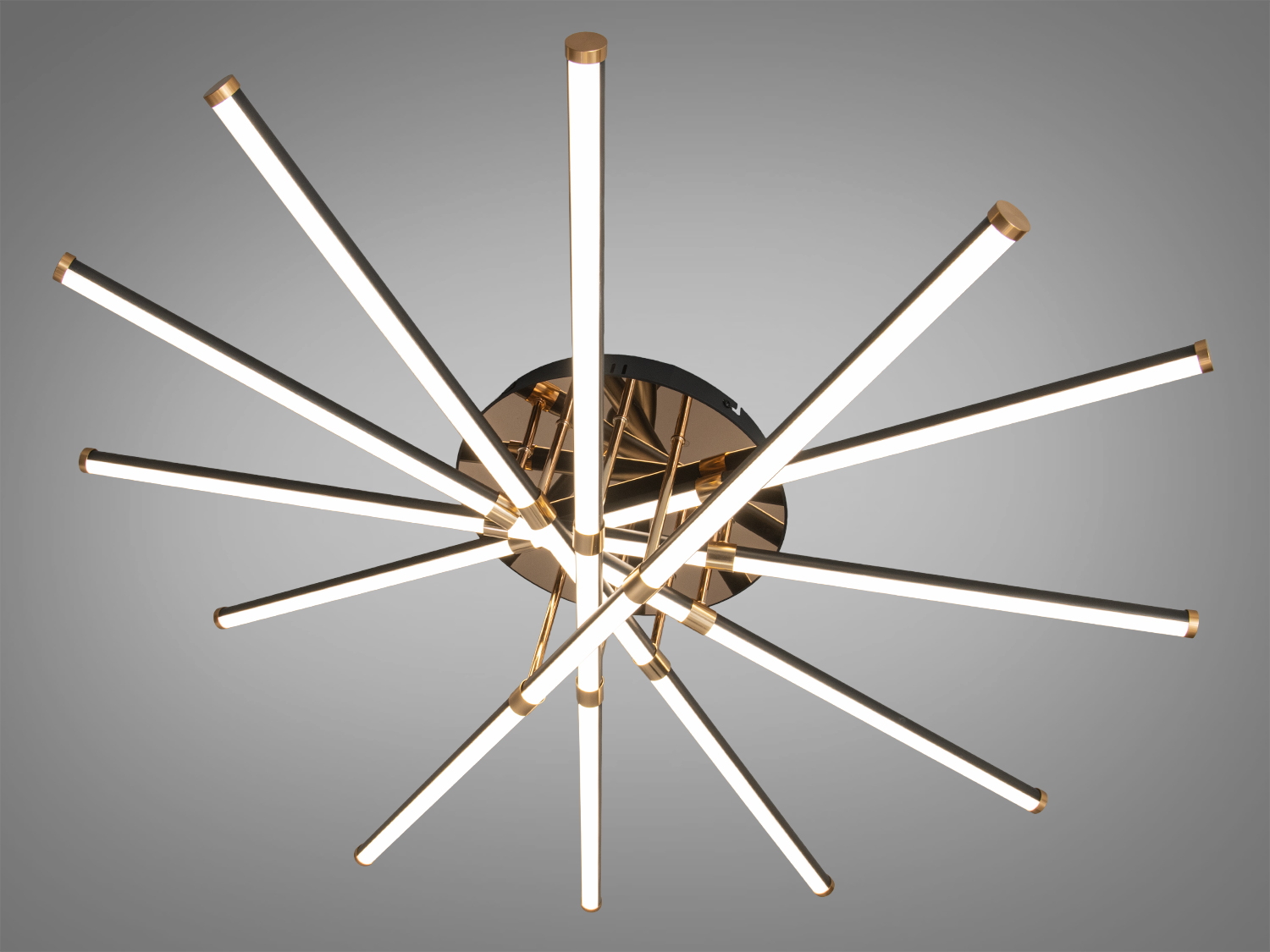 Стельовий світильник з 12 світлодіодними трубками, що виходять з центральної основи, створює динамічний ефект у просторі.