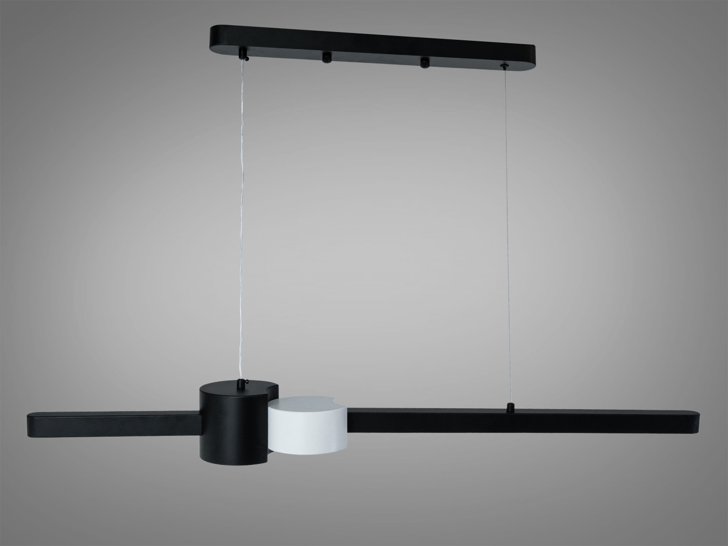 Підвісний світильник з чорним і білим циліндром, горизонтальні планки, підходить для сучасного інтер’єру.