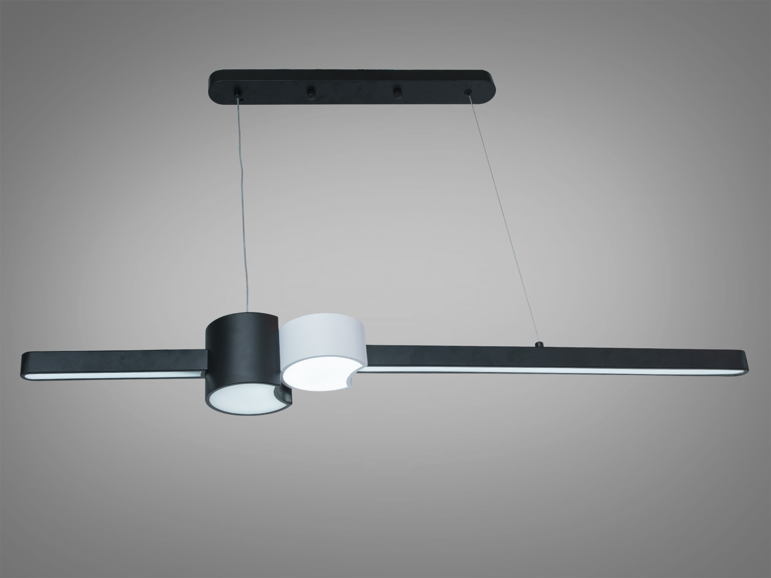 Світильник з чорним і білим циліндром, підвісний монтаж, світлодіодне освітлення, стиль мінімалізм.