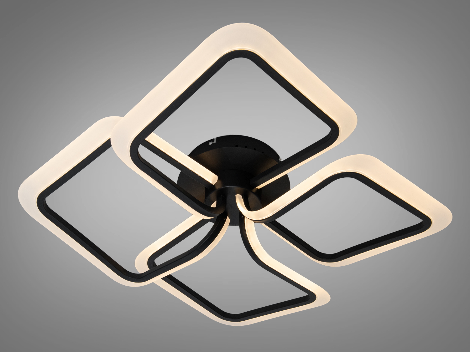 Світильник з теплим світлом, чотири квадратні рамки, стильний дизайн для вітальні.