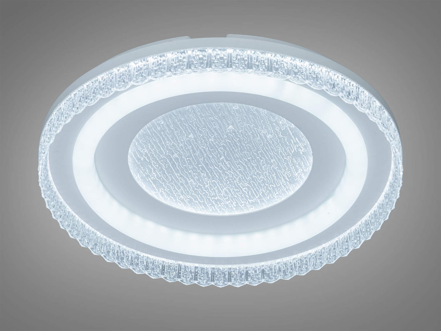 Світлодіодний світильник з прозорим обідком, підходить для сучасних інтер′єрів, забезпечує яскраве освітлення.