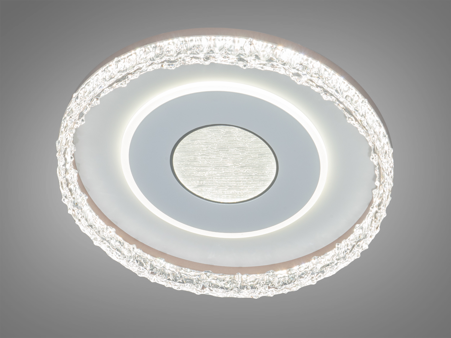 Стельова лампа з круглим дизайном і світлодіодним підсвічуванням. Прозорий рельєфний край підкреслює стиль хай-тек для сучасних приміщень.